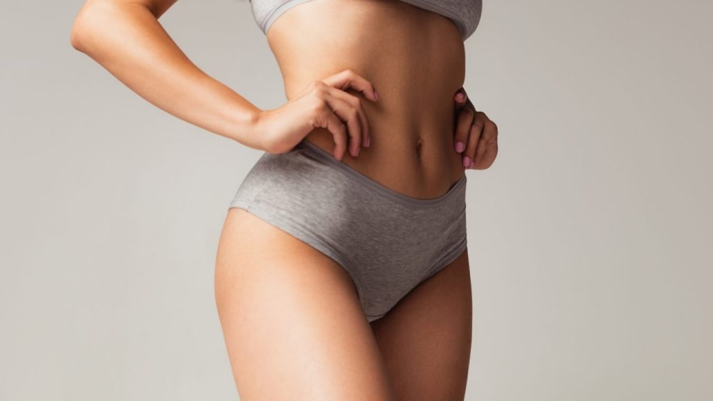 Woman in grey sports bra and underwear
