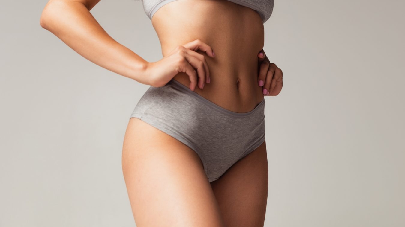 Woman in grey sports bra and underwear