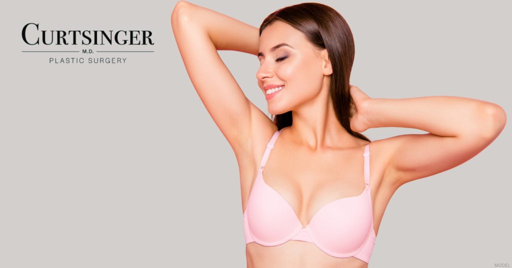 Women showcasing ballerina breast augmentation results (model)